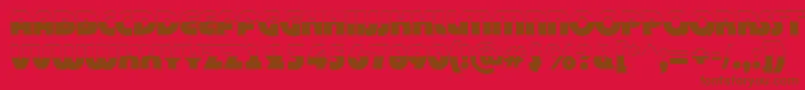 BighaustitulbwRegular-Schriftart – Braune Schriften auf rotem Hintergrund