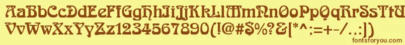 フォントRomanesteRegular – 茶色の文字が黄色の背景にあります。