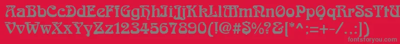 フォントRomanesteRegular – 赤い背景に灰色の文字