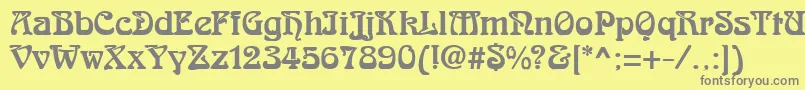 フォントRomanesteRegular – 黄色の背景に灰色の文字