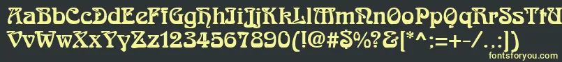 フォントRomanesteRegular – 黒い背景に黄色の文字