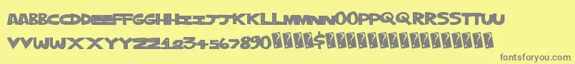 Fonte Trippledots – fontes cinzas em um fundo amarelo