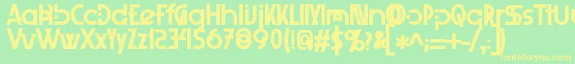 フォントXelitabold – 黄色の文字が緑の背景にあります