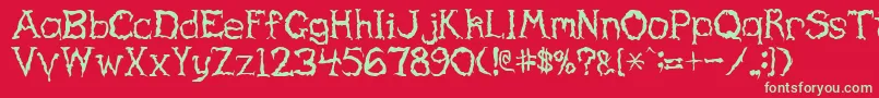 HauntedRegular Font – Green Fonts on Red Background