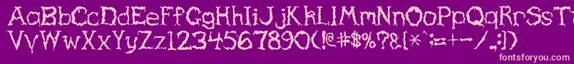 HauntedRegular Font – Pink Fonts on Purple Background