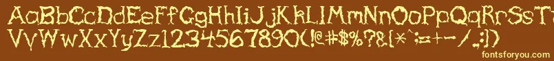 HauntedRegular Font – Yellow Fonts on Brown Background