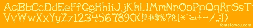 HauntedRegular-Schriftart – Gelbe Schriften auf orangefarbenem Hintergrund