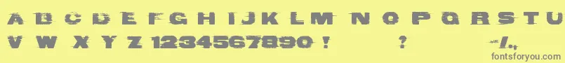 フォントBadComa – 黄色の背景に灰色の文字