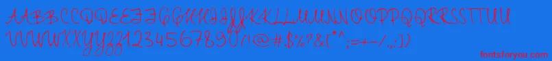 TtRabbitsElfDemo Font – Red Fonts on Blue Background