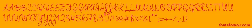 TtRabbitsElfDemo Font – Red Fonts on Orange Background