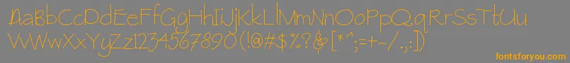フォントRaspberrygranola – オレンジの文字は灰色の背景にあります。