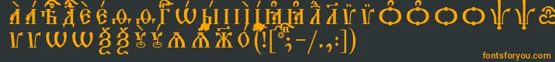 フォントTriodionCapsIeucsSpacedout – 黒い背景にオレンジの文字