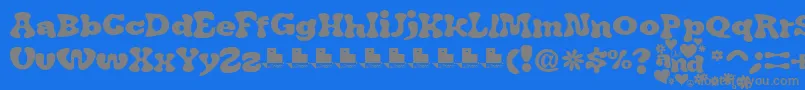 Fonte JAirplaneSwashFont – fontes cinzas em um fundo azul