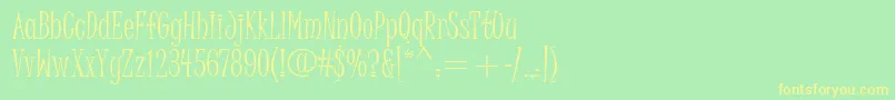 フォントJuiceItc – 黄色の文字が緑の背景にあります