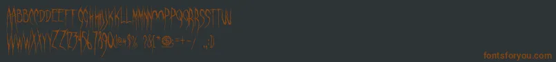 GhastlyPanic Font – Brown Fonts on Black Background