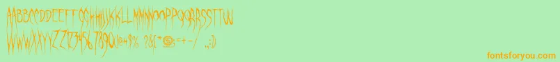 GhastlyPanic Font – Orange Fonts on Green Background