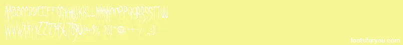 GhastlyPanic Font – White Fonts on Yellow Background