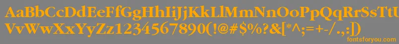 フォントAggcb – オレンジの文字は灰色の背景にあります。