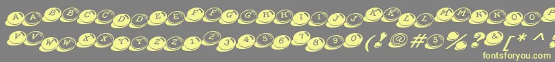 CandyBitsBt Font – Yellow Fonts on Gray Background