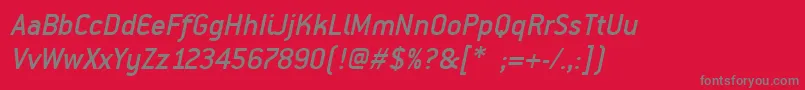 フォントPfpremierMediumItalic – 赤い背景に灰色の文字