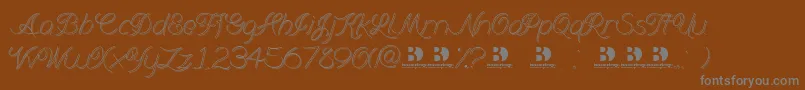 Weitere Informationen zur Branumcursive-Schriftart Branumcursive-Schriftart – Graue Schriften auf braunem Hintergrund