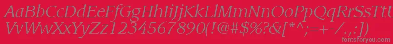 ItcLeawoodLtBookItalic-fontti – harmaat kirjasimet punaisella taustalla