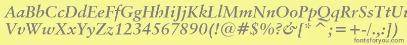 フォントClassicalGaramondBoldItalicBt – 黄色の背景に灰色の文字