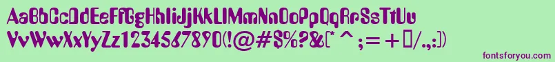 Yellowsubmarine Font – Purple Fonts on Green Background