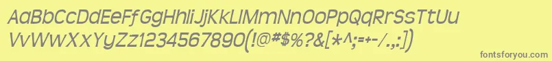 Teenital-fontti – harmaat kirjasimet keltaisella taustalla