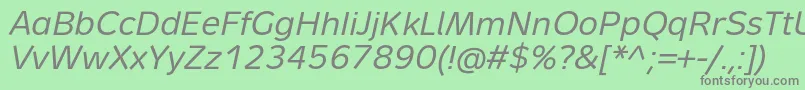 フォントMetronTextProItalic – 緑の背景に灰色の文字