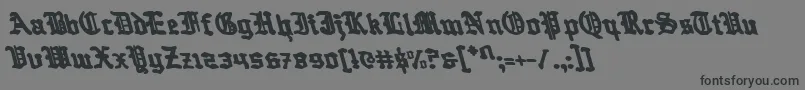 フォントQuestKnightLeftalic – 黒い文字の灰色の背景