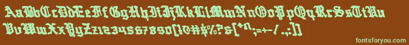 フォントQuestKnightLeftalic – 緑色の文字が茶色の背景にあります。