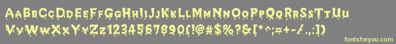 JdMelted Font – Yellow Fonts on Gray Background