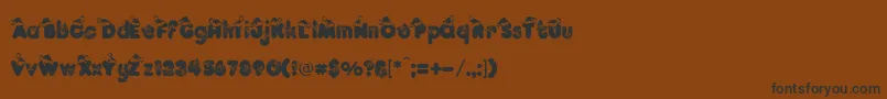 Шрифт KringleRegular – чёрные шрифты на коричневом фоне
