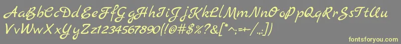 MarckScript Font – Yellow Fonts on Gray Background