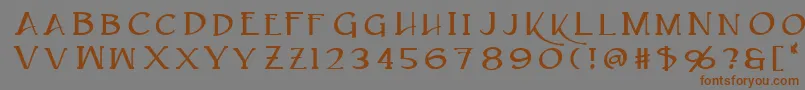 フォントCaeldera – 茶色の文字が灰色の背景にあります。