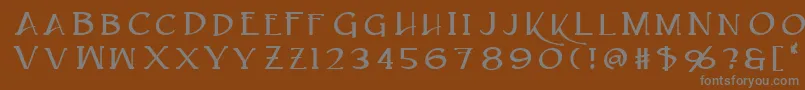 フォントCaeldera – 茶色の背景に灰色の文字