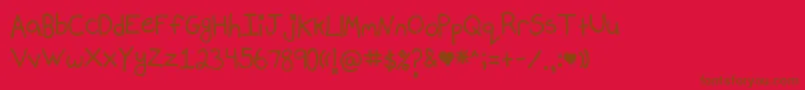 フォントMallorymaloneyshandwriting – 赤い背景に茶色の文字