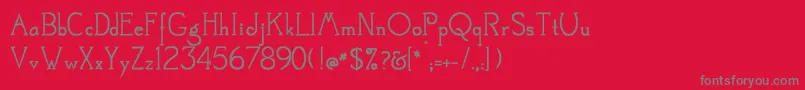 フォントMestral – 赤い背景に灰色の文字