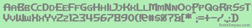 フォントManhattanTowerBold – 緑の背景に灰色の文字