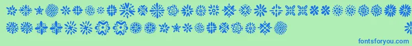 Więcej informacji o czcionce Kembang Czcionka Kembang – niebieskie czcionki na zielonym tle