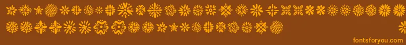 Więcej informacji o czcionce Kembang Czcionka Kembang – pomarańczowe czcionki na brązowym tle