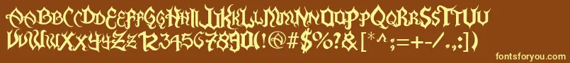 FlamaEspina-fontti – keltaiset fontit ruskealla taustalla