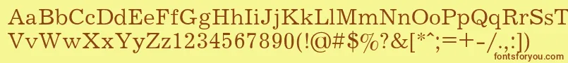 フォントJournalRegular – 茶色の文字が黄色の背景にあります。