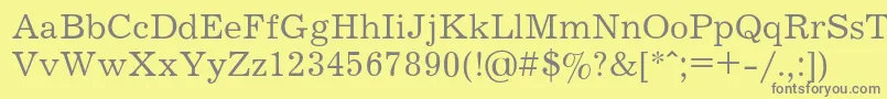 フォントJournalRegular – 黄色の背景に灰色の文字