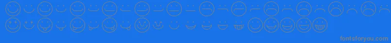 Fonte SmileyRegular – fontes cinzas em um fundo azul