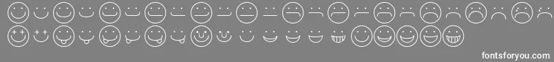 フォントSmileyRegular – 灰色の背景に白い文字