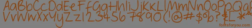 Шрифт DjbGeordieGirl – коричневые шрифты на сером фоне