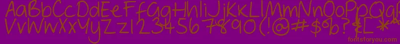 DjbGeordieGirl-Schriftart – Braune Schriften auf violettem Hintergrund