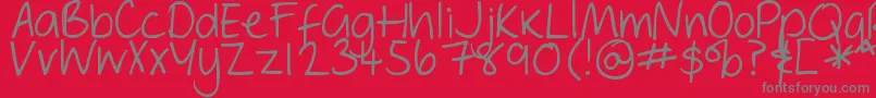 DjbGeordieGirl-fontti – harmaat kirjasimet punaisella taustalla